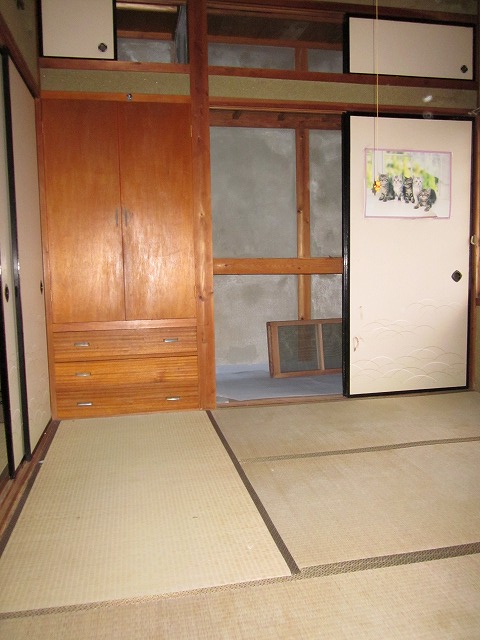 Living and room. With fitted wardrobe.