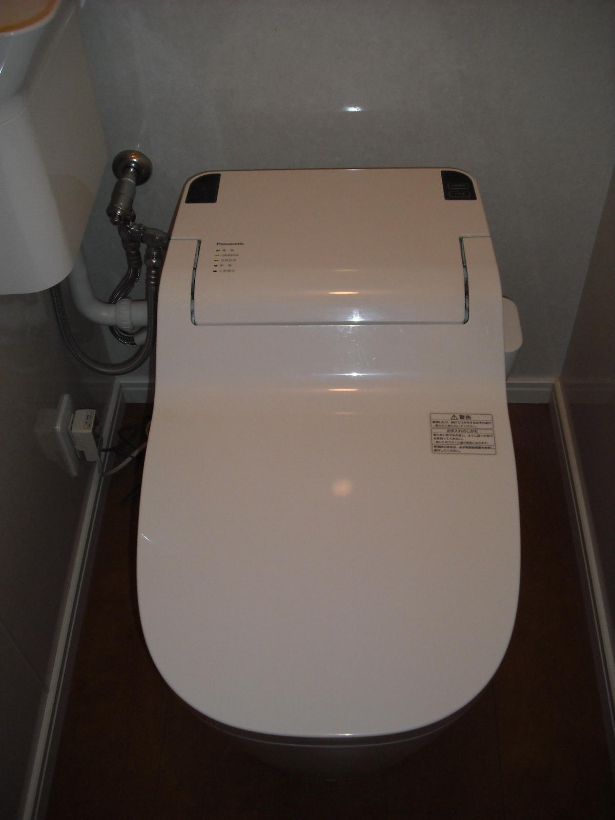 Toilet. The photograph is a reference model. There is also a case of there tank.