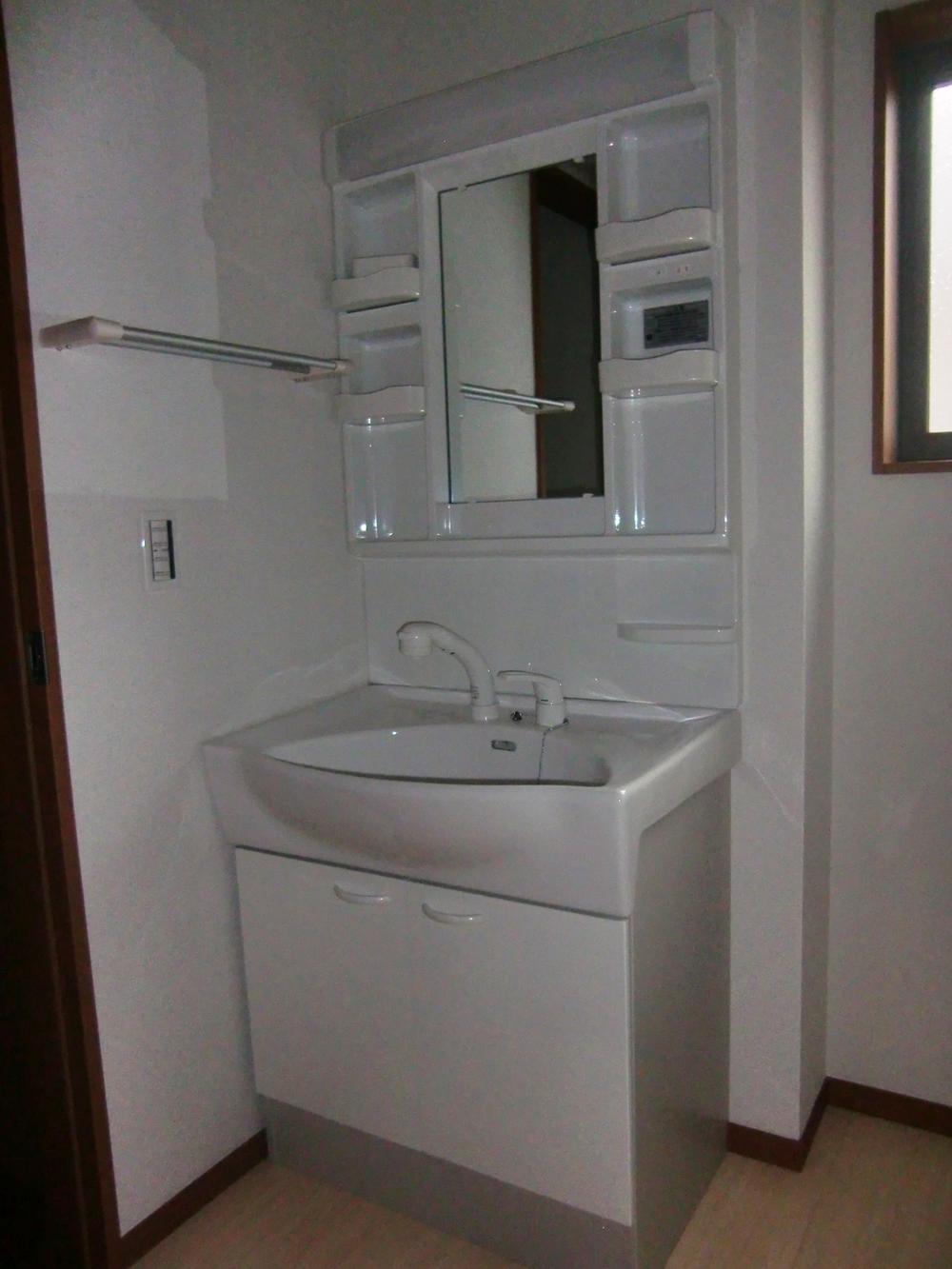 Wash basin, toilet. Bathroom vanity