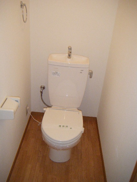 Toilet. A heated toilet seat