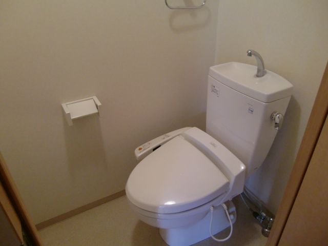Toilet. It is a toilet with a heated cleaning toilet seat.