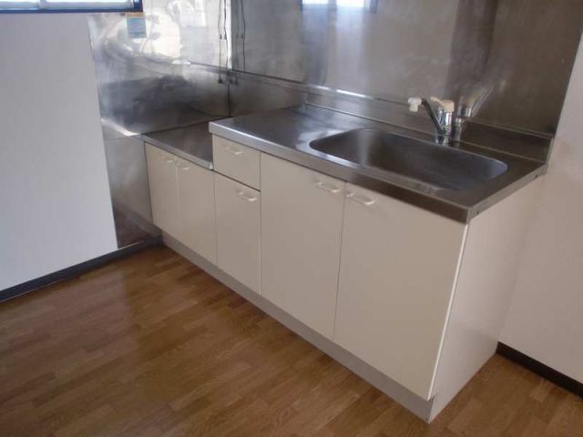 Kitchen. There chopping board space. Gas stove installation Allowed.
