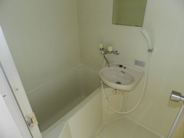 Bath. Simple wash basin, With mirror! It is easy to unit bus Care.