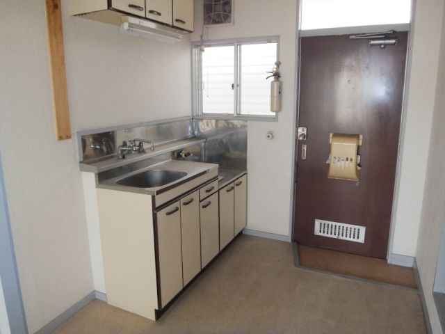 Kitchen. It is bright rooms and comes with a small window.