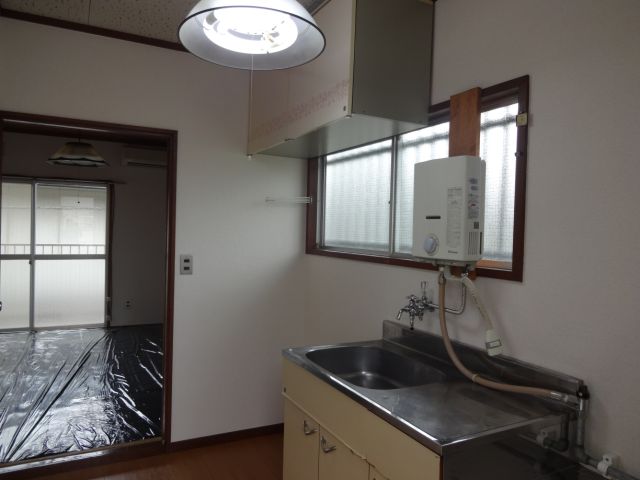 Kitchen. With water heater