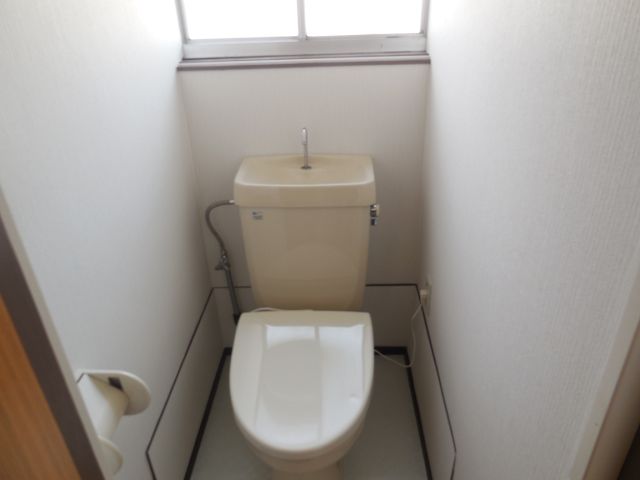 Toilet. It is with warm toilet.