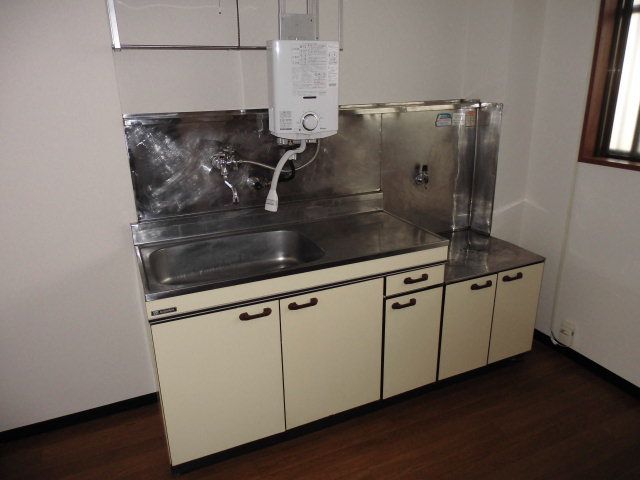 Kitchen. Gas stove can be installed, Also it comes with water heater