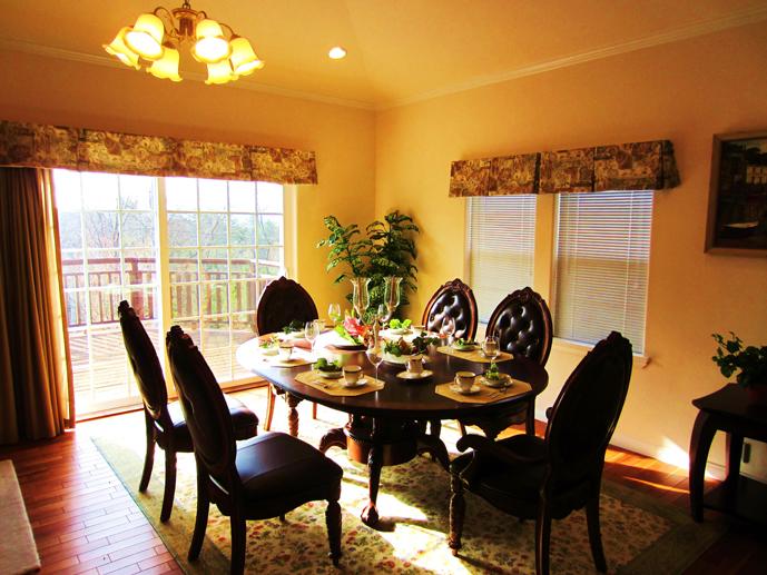 Non-living room. Dining: a wood-burning fireplace is equipped, Also features a table set.