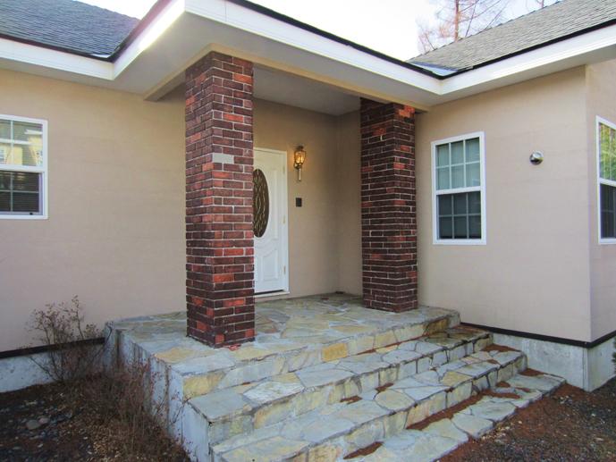 Entrance. Entrance approach side of appearance: equipped with built-in garage with auto shutter, Exterior stucco finish.