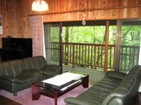 Living. From the living room window you have blown a fresh breeze throughout the green.