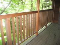 Balcony. It comes with a wood deck in front of the living room.