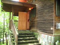 Entrance. To the front door and up the stairs of several stages.