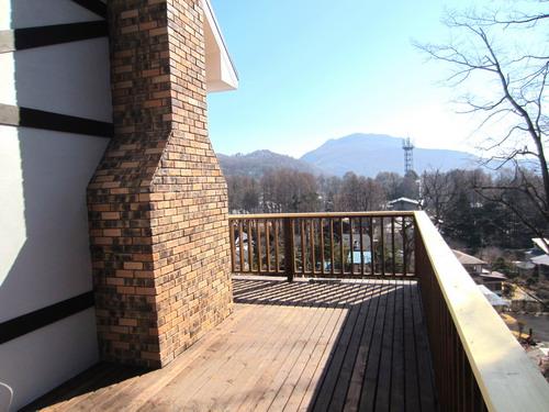Balcony. Karuizawa view from wood deck, The front of the mountain is Hanareyama of Karuizawa specialties.