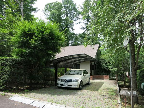 Parking lot. It is safe a car port with a roof in the rain and snow.