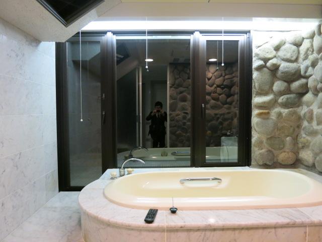 Bathroom. Bathroom stone-clad, It is also spacious size. Outside the window is overlooking the lush greenery.