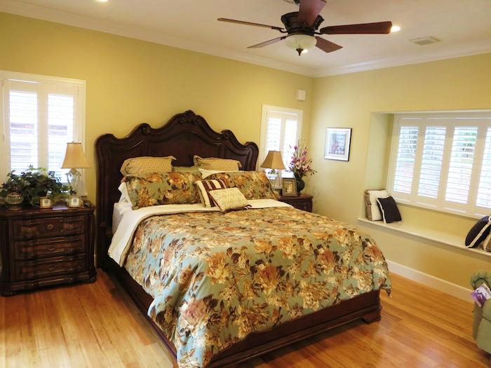 Non-living room. Ceiling fans in the main bedroom unique American House.
