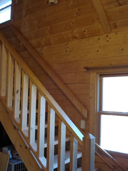 Non-living room. Also it has become a finish of warm wood open staircase.