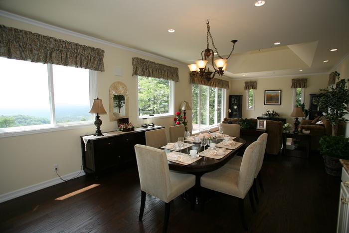 Non-living room. Dining Room: becoming furnished, such as a table set and lighting equipment.