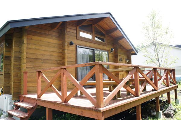 Balcony. Also widely out a large table relax on the deck wood deck.