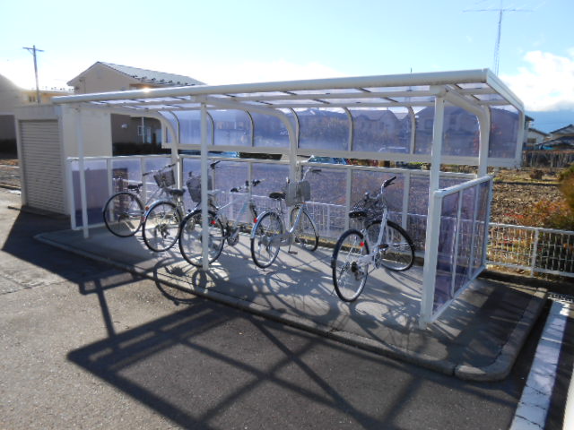 Parking lot. Bicycle parking lot (shared) equipped