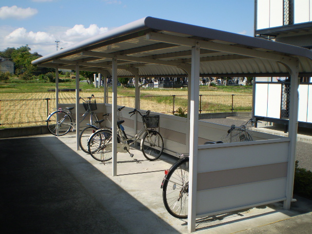 Parking lot. Bicycle parking lot (shared) equipped