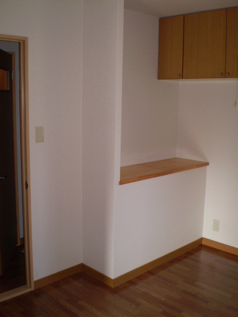 Other room space. Small storage shelves equipped in the dining