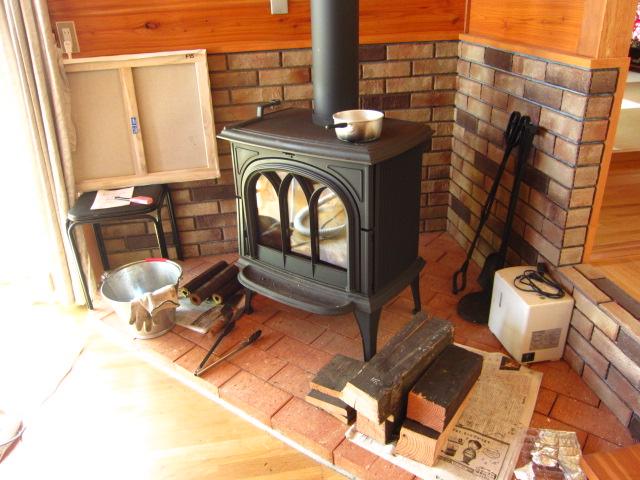 Other introspection. Wood-burning stove, which was established in the living room corner.
