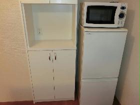 Kitchen. refrigerator, microwave, Storage box equipped