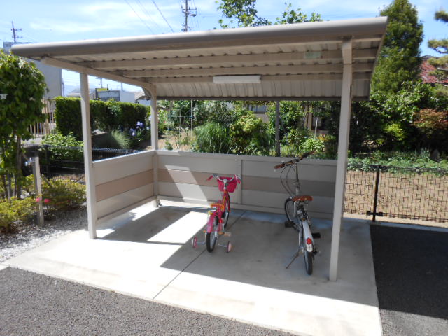 Parking lot. Bicycle parking lot (shared) equipped