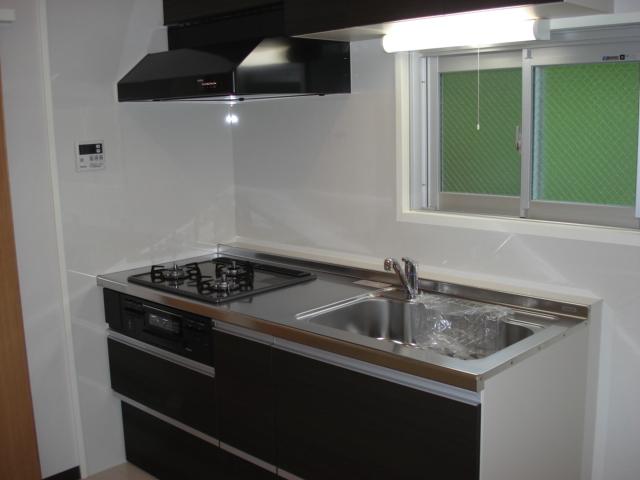 Kitchen. Refrigerator can be installed in the large kitchen next to you had made size