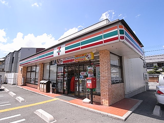 Convenience store. Seven-Eleven Kashiba Nishimami store up (convenience store) 647m