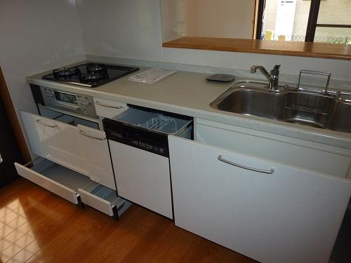Kitchen. It is housed in a versatile stove with glass top!