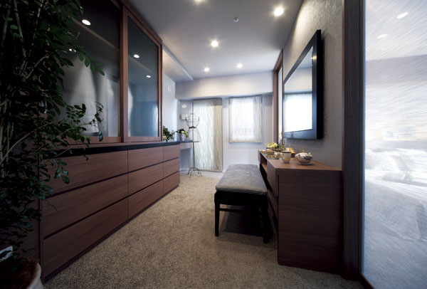 Interior.  [Dressing room] Next to the master bedroom, Place the independence has been dressing room with sliding door of glass. Not only to enrich the function as wardrobe, It has also been consideration as literate as the room of study and hobbies (A-A type model room)