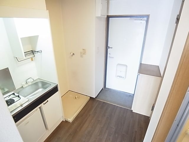 Living and room. It also also equipped spacious washing machine Storage foyer