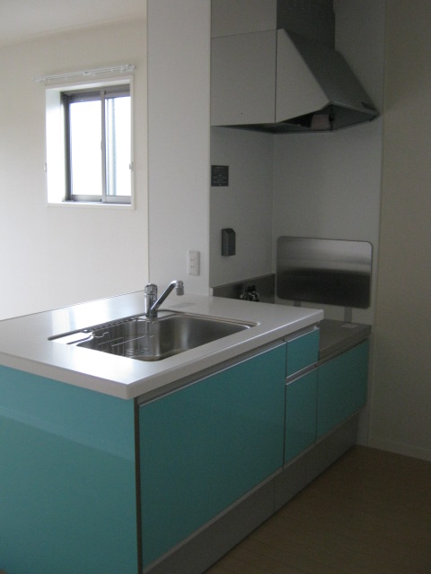 Kitchen. A cute light blue of the kitchen