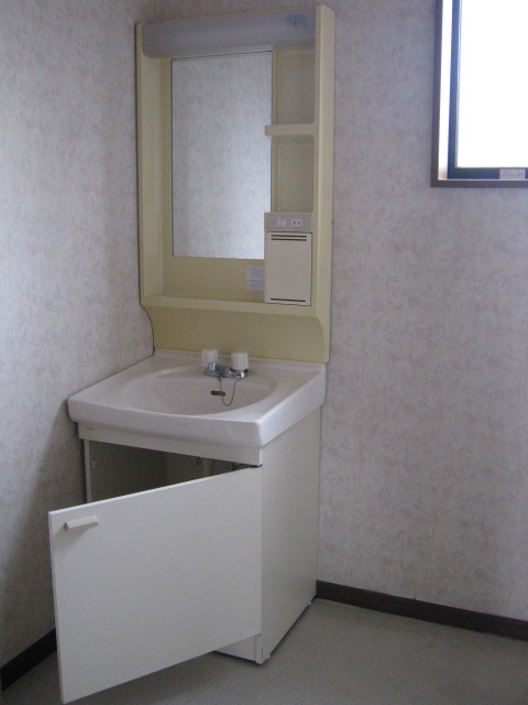 Washroom. There is also a wash basin