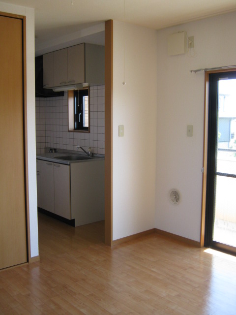 Other room space. The kitchen is a space in the back