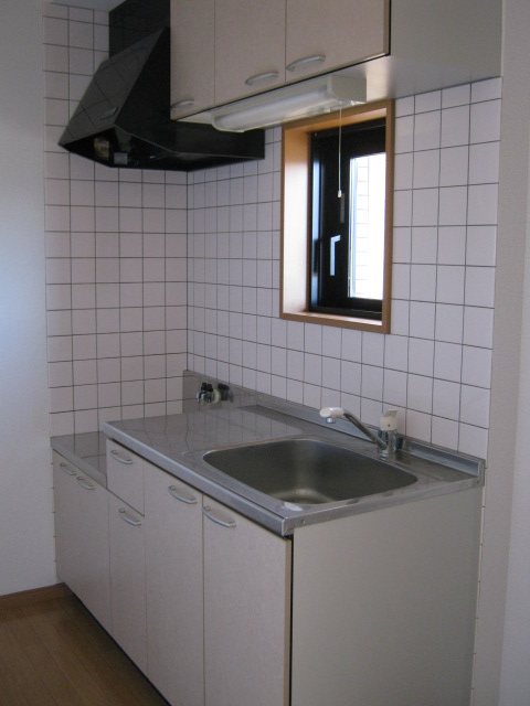 Kitchen. Ease is likely to kitchen use there is also a window