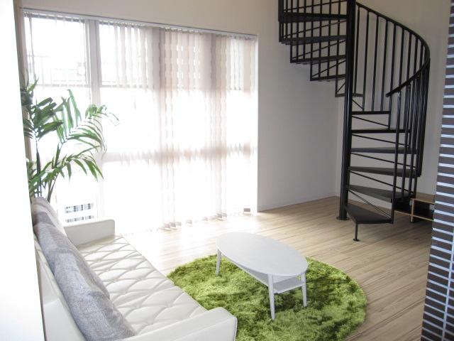 Living. Spiral staircase