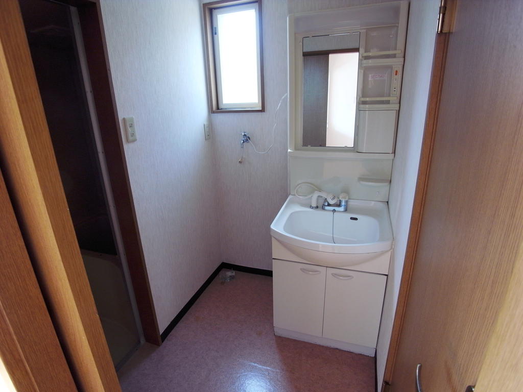 Washroom. Shampoo dresser Bright washroom of with window