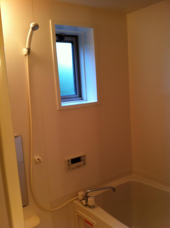 Bath. Reheating hot water supply. There is a window, Airy bathroom
