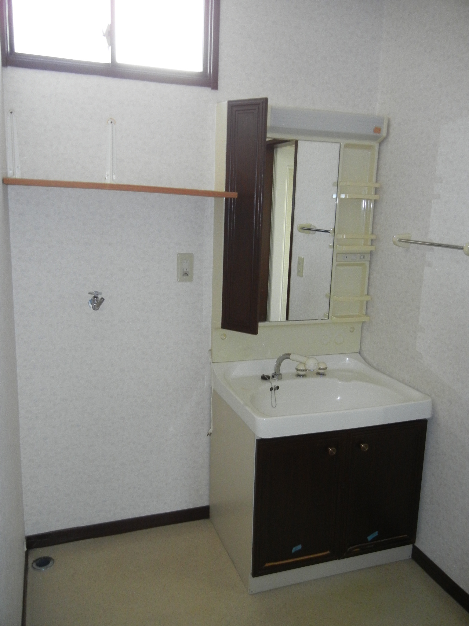 Washroom. The first floor basin & Laundry Area & dressing room