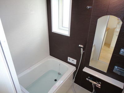Bath. Window with a bath reheating hot water supply