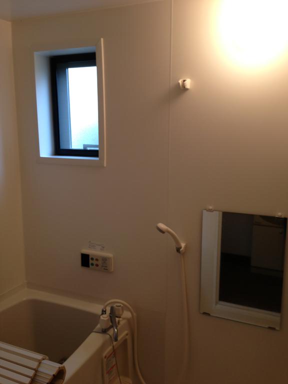 Bath. There is a window, Airy bathroom. Reheating hot water supply