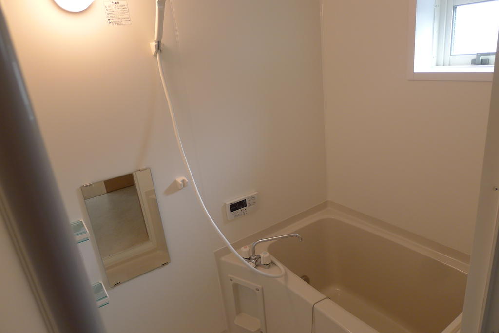 Bath. It is larger than the general apartment bathtub! With window