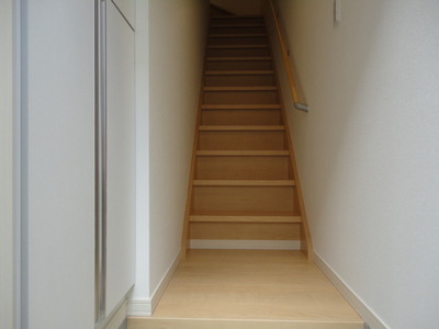 Other room space. Stairs from the entrance to the second floor living room