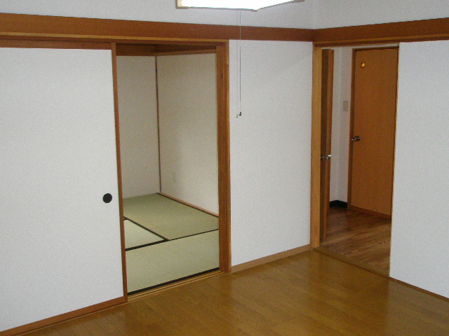 Living and room. Japanese and Western has been divided by a sliding door