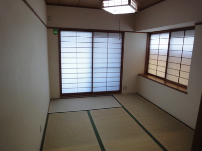 Living and room. Japanese-style room 6 Pledge (The photograph is a corner room)