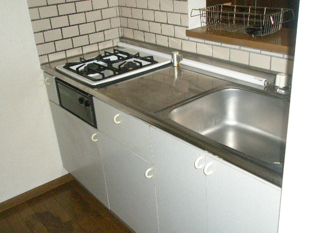 Kitchen. Built-in is a stove in the kitchen. 