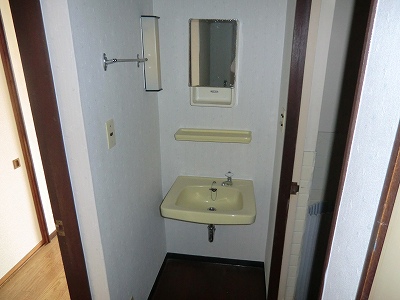 Washroom. It is with a wash basin. 